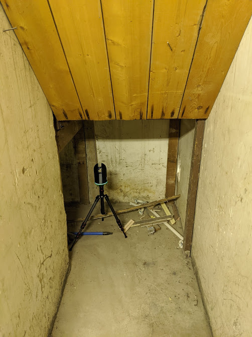 Leica BLK scanning under the stairs to the basement of the annex during digital documentation of Old Sun. August 2020. Photo source: Madisen Hvidberg.