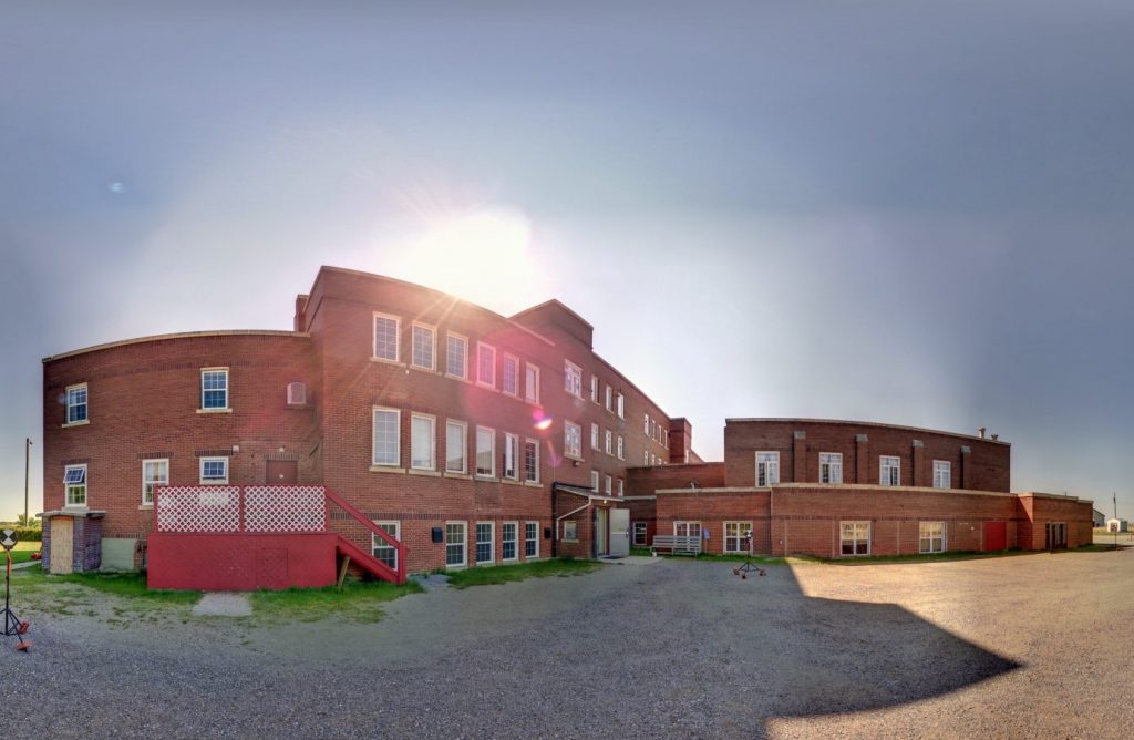 Panosphere photo of the northwest exterior of Old Sun taken during digital documentation of the school.  August 2020. Image from Z+F IMAGER 5010X.