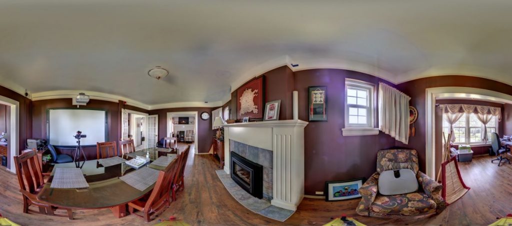 Boardroom office of the Siksika Studies department at Old Sun Community College, formerly the dining room of the minister's quarters. Photo from digital capture of Old Sun, August 2020.