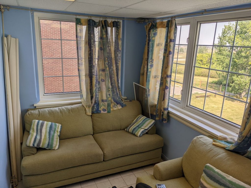 Staff sitting area, previously used as the infirmary for Old Sun IRS. Photo Source: Madisen Hvidberg.