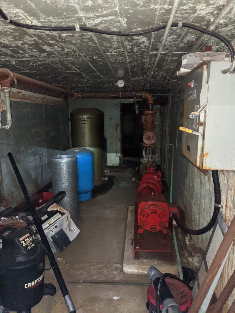 UnBQ boiler room, largely unchanged since its time as a residential school. Taken during digital documentation, August 2022. From Madisen Hvidberg.