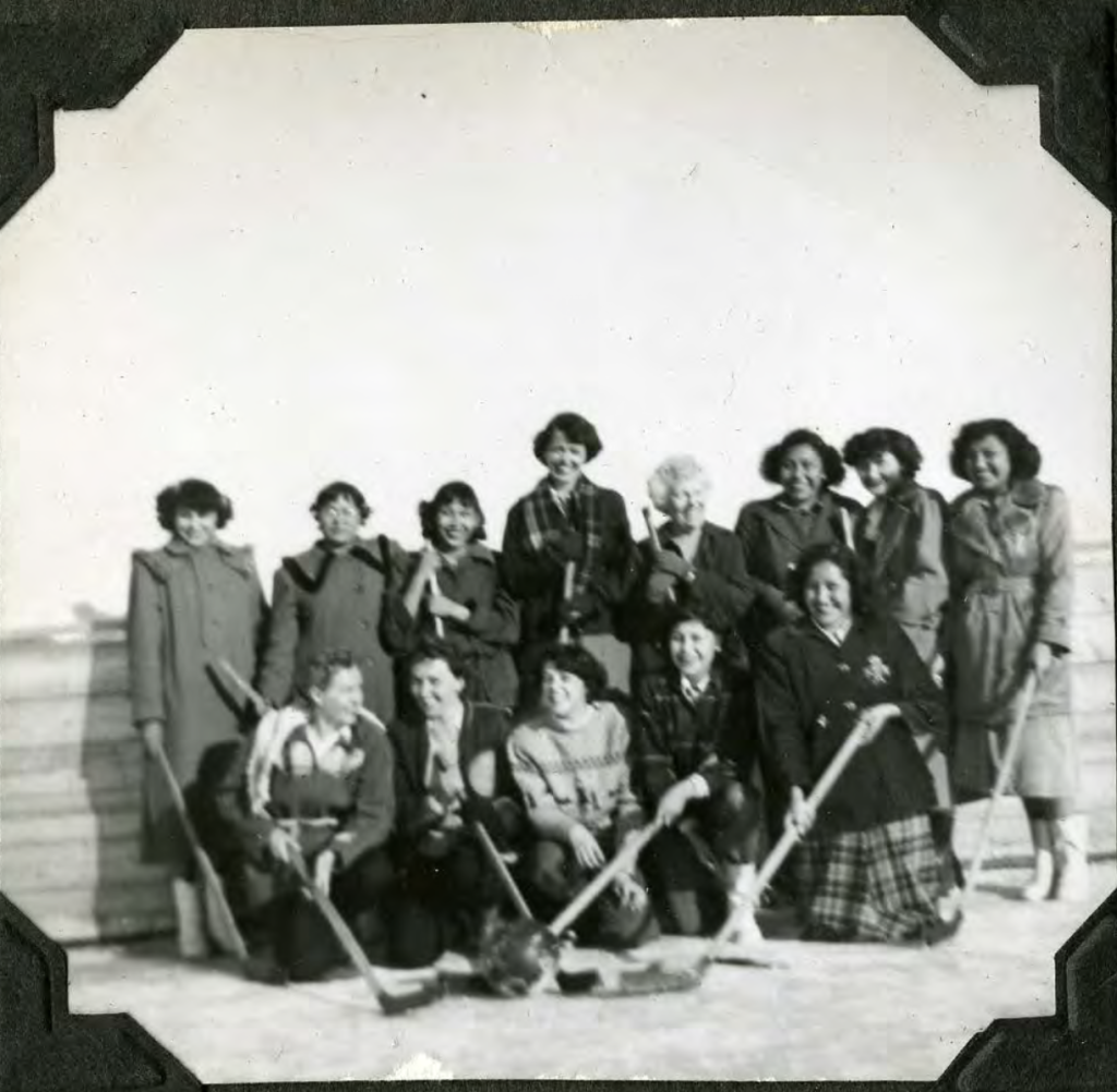 Girls broomball team. 1950s. Shingwauk Residential Schools Centre, Algoma University