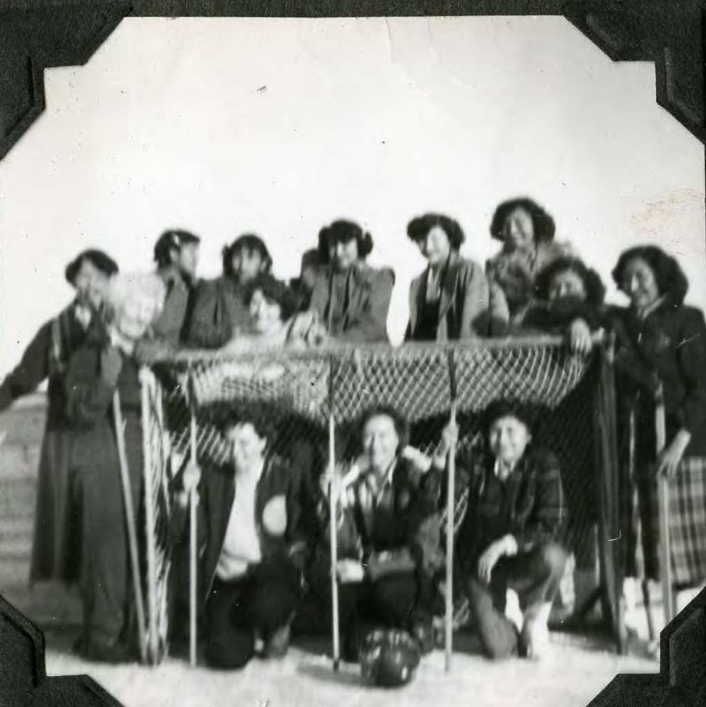 Girls' broomball team. 1950s. Shingwauk Residential Schools Centre, Algoma University