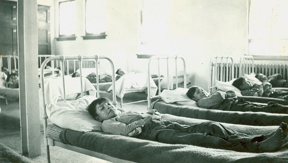 Junior boys resting - [193-?]. P75-103-S7-167. The General Synod Archives, Anglican Church of Canada