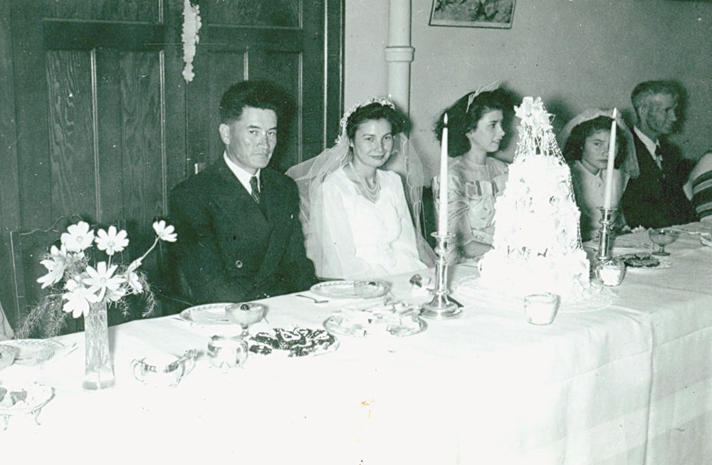 The Wedding Breakfast. Head table at the reception for wedding of Alieen Ayoungman (former student) and Horace Gladstone taken in the student dining area- [195-?]. P7538-1001 from The General Synod Archives, Anglican Church of Canada