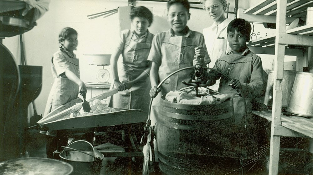 Making butter. - 1945. P7538-1006 from The General Synod Archives, Anglican Church of Canada