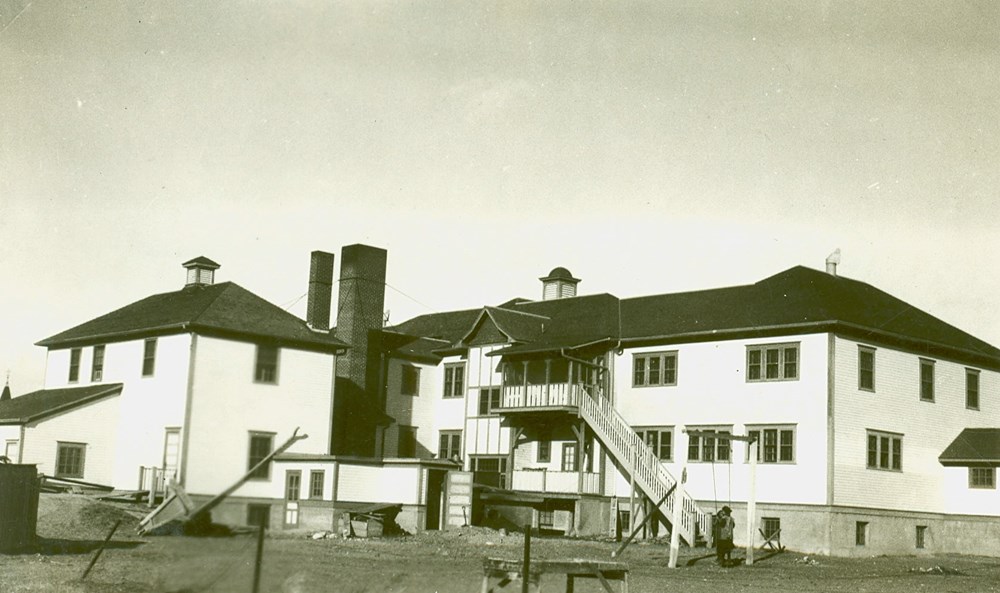 Blackfoot Old Sun School, Gleichen, Alberta - Southeast view of main building. - [192-?]. P7538-673 from The General Synod Archives, Anglican Church of Canada.