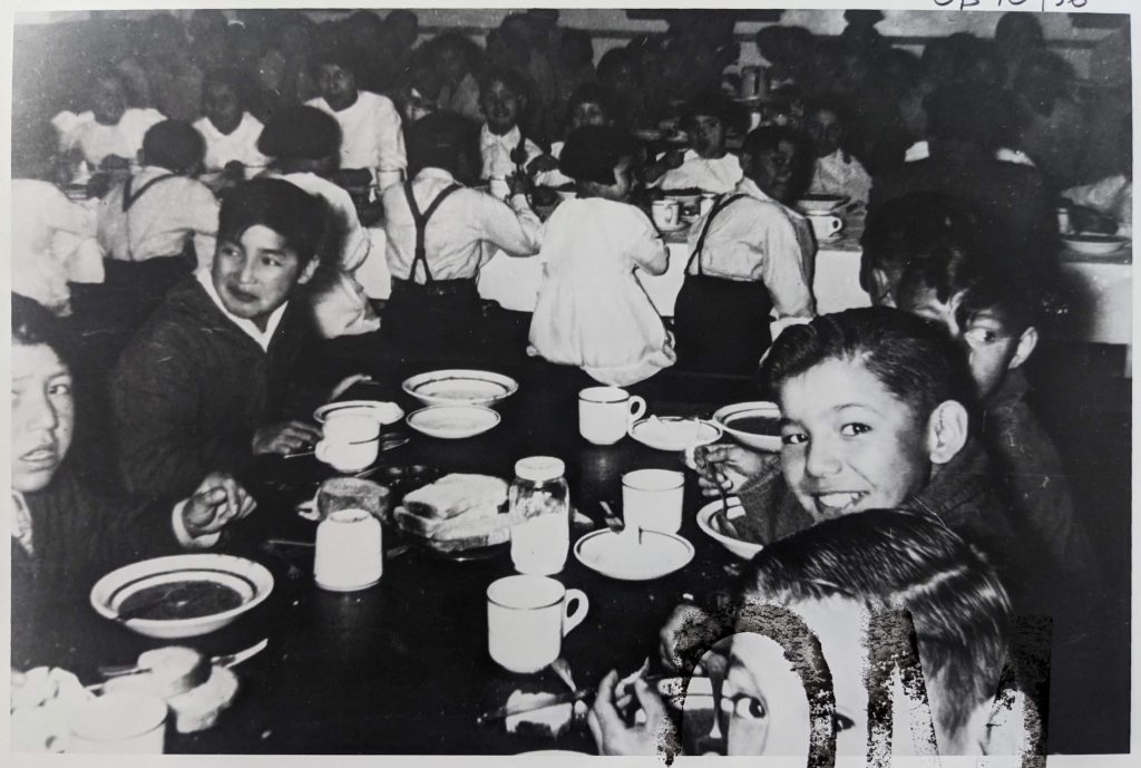 Students eating in the UnBQ dining room, 1950-1951. OB10456 from The Provincial Archives of Alberta, Open Copyright.