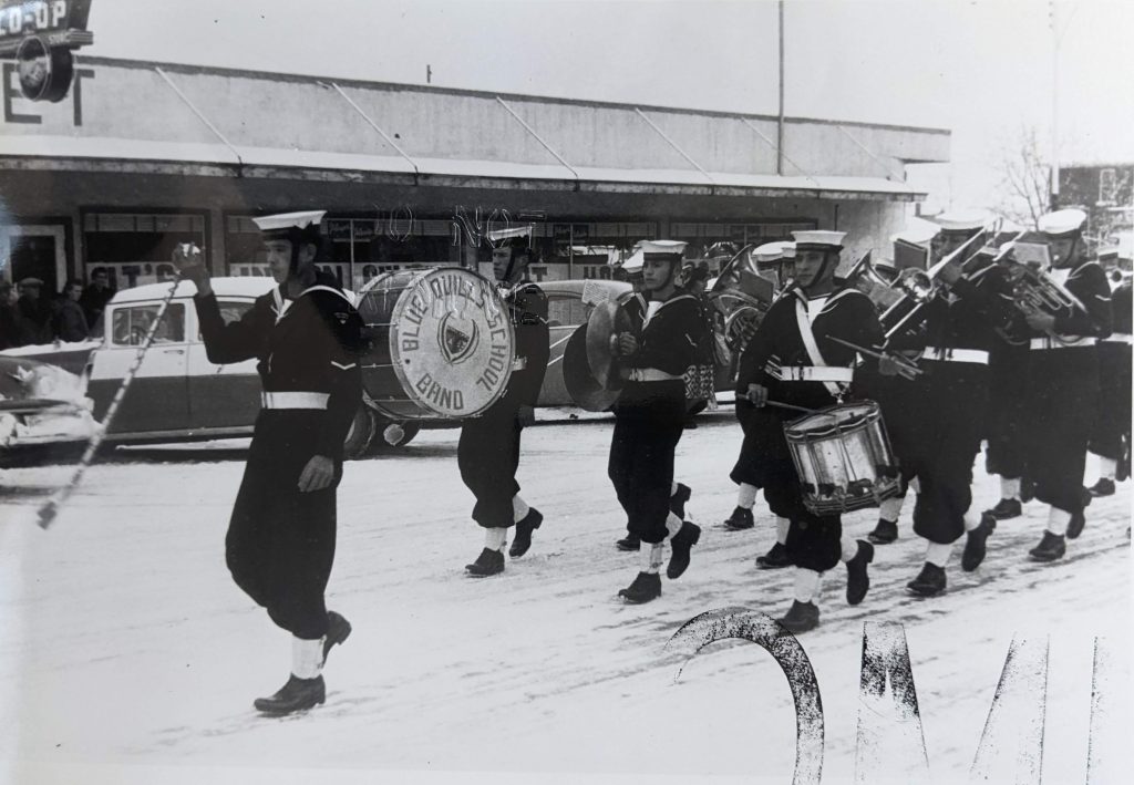 Blue Quills school band marches down main street of St Paul, date unknown. OB2011 from The Provincial Archives of Alberta, Open Copyright.