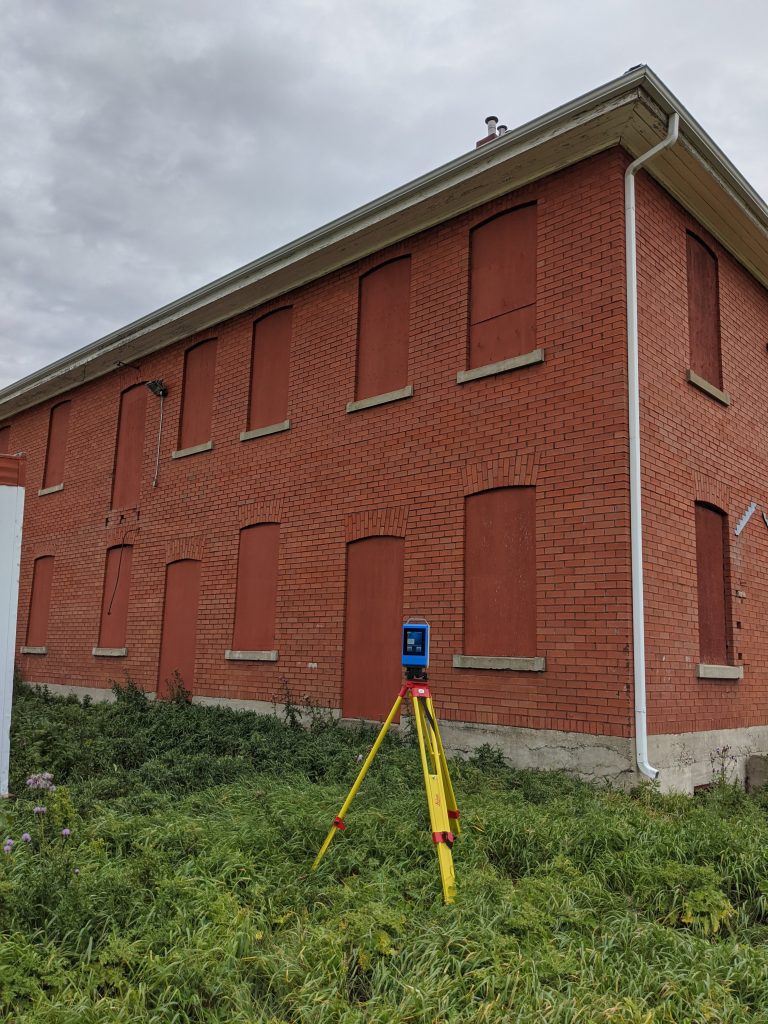 North side of carriage house during documentation with Z+F 5010X terrestrial laser scanner, visible in the open door. October 20202. From Madisen Hvidberg.