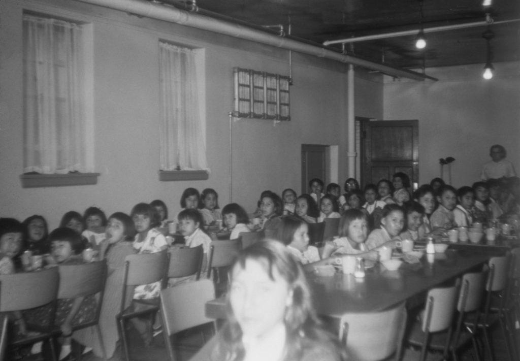 Girls in dining-room, Old Sun School. 1955-1957. NA-4817-18. Courtesy of Glenbow Archives .