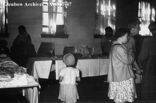 Bazaar set up in dining room at Old Sun School.  1956. NA-4817-47. Courtesy of Glenbow Archives .