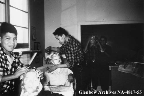 Making paper mache masks for Halloween. 1955-1957. NA-4817-55. Courtesy of Glenbow Archives .