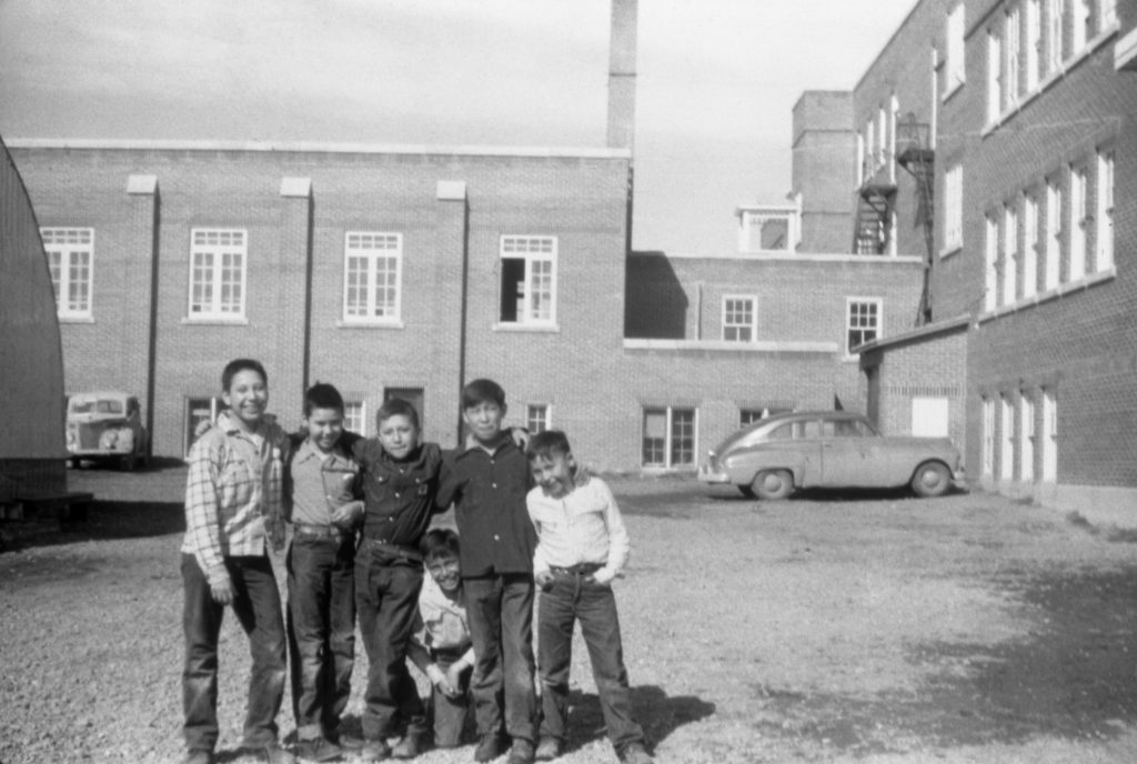 Boys outside the boys' playroom. 1955-1957. NA-4817-8. Courtesy of Glenbow Archives .