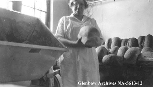 Mary Jane Hoey baking bread. ca. 1930 CU114214. Courtesy of Glenbow Library and Archives Collection, Libraries and Cultural Resources Digital Collections, University of Calgary.