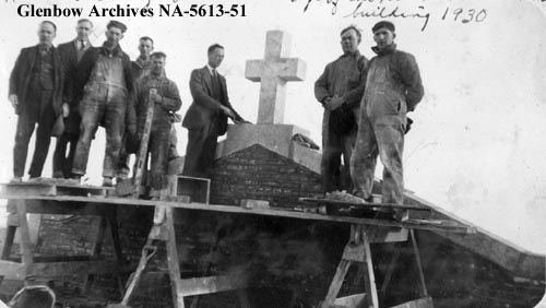 Rev. Ross Gibney and builders completing new Old Sun School, Blackfoot reserve, Alberta. 1930. CU1142407). Courtesy of Glenbow Library and Archives Collection, Libraries and Cultural Resources Digital Collections, University of Calgary.