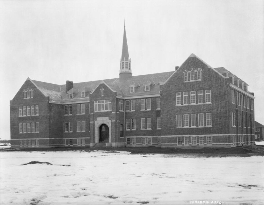 Edmonton Indian Residential school, 1924. Carriage house visible to the right. CU155958 by McDermid Studio. Courtesy of  Collection, Libraries and Cultural Resources Digital Collections, University of Calgary.